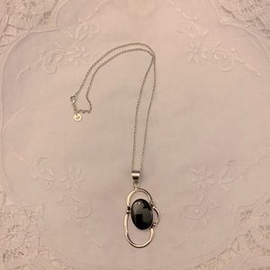 Stirling silver necklace and pendant.